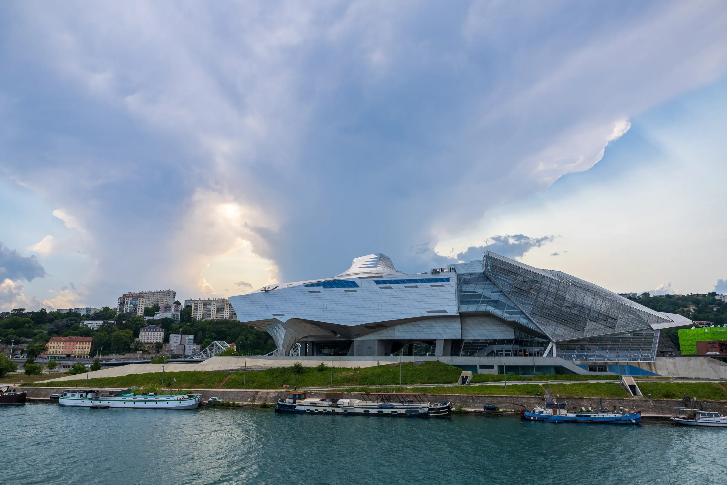 Musée des Confluences — futuristic stainless steel and glass building by the Rhône, Lyon