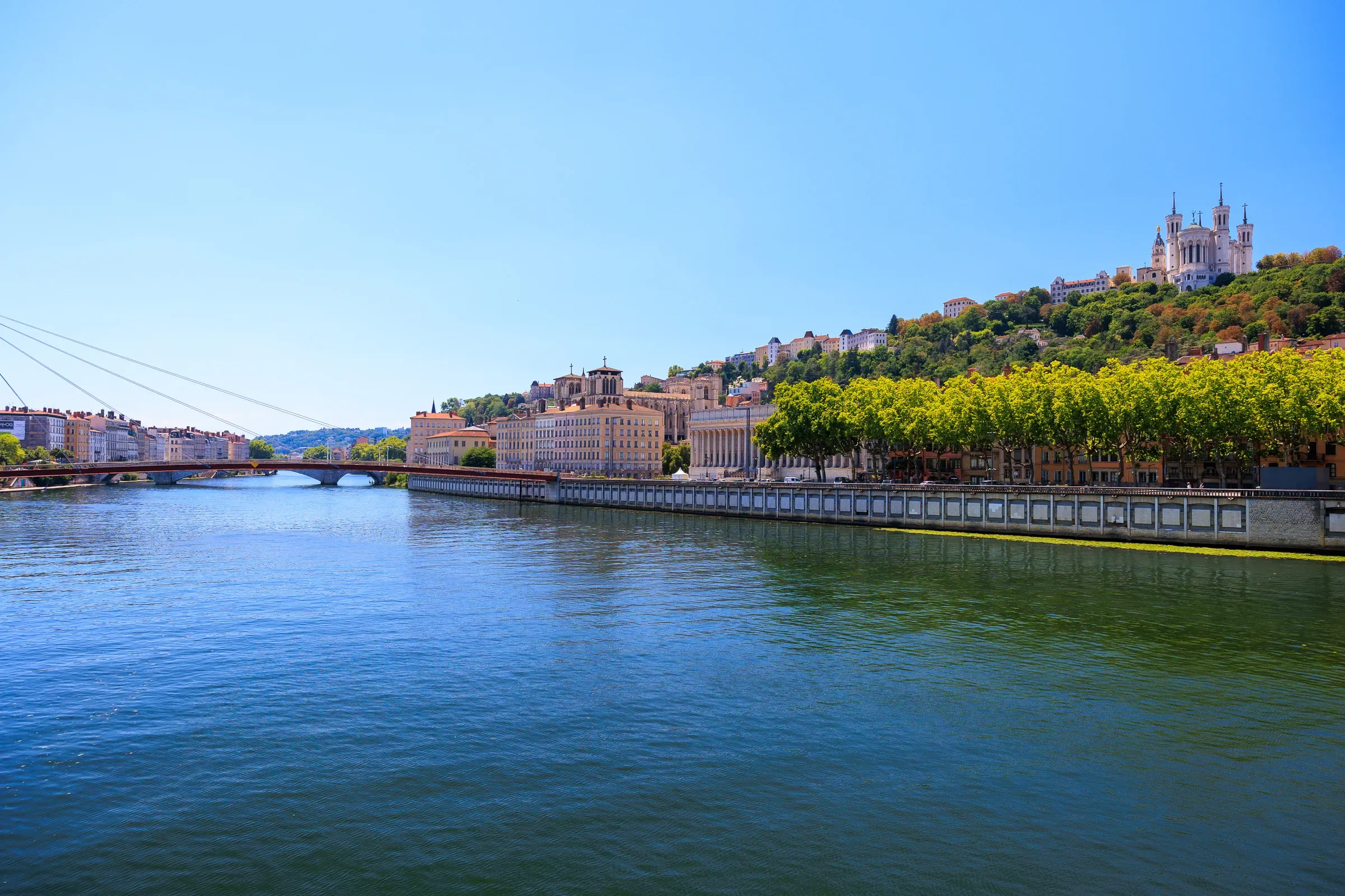 View of the Saône river with Fourvière basilica on the hill, Lyon